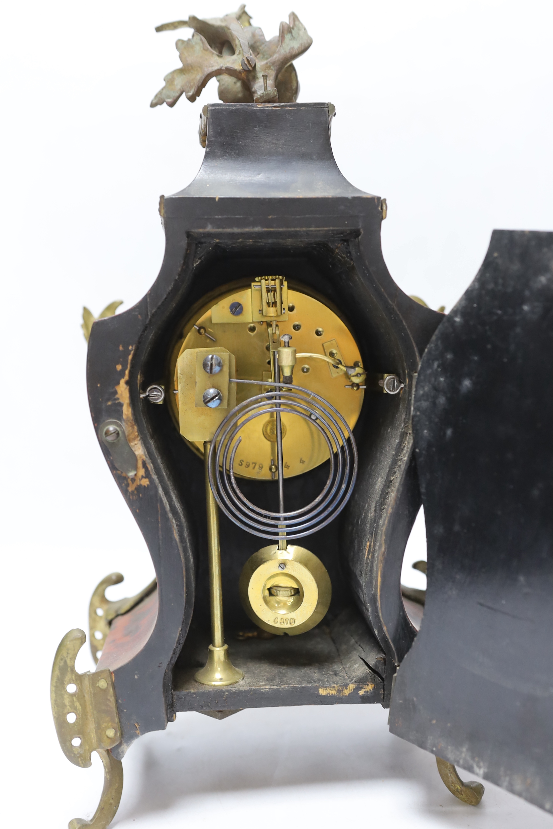 A late 19th century Louis XV style eight day red tortoiseshell and gilt metal cased mantel clock, 34cm high